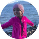 Child in pink jacket outdoors supported by Give Hope Nevada